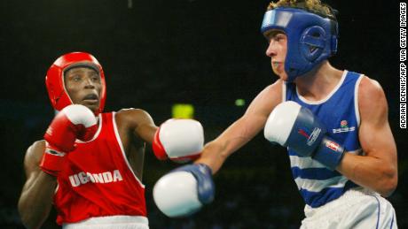 Kayongo (left) boxes England's Darren Barker in the 63.5kg final at the 2002 Commonwealth Games in Manchester.