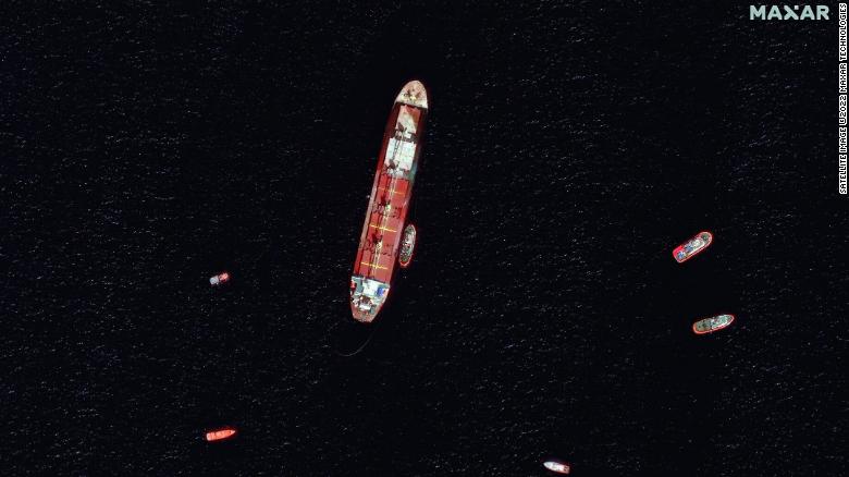 Satellite imagery shows the damaged and partially submerged OS 35 cargo ship off the coast of Gibraltar. 