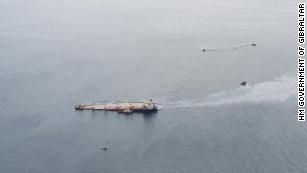 Gibraltar races to stop oil leak from ship collision with gas 