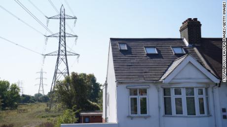 Electricity pylons in East London on Aug. 25. The country&#39;s regulator has confirmed energy bills could rise 80% in October.