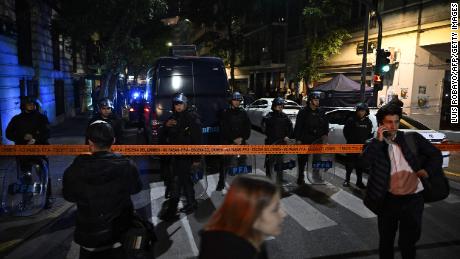 Police stand guard outside the residence of Cristina Fernandez de Kirchner in Buenos Aires on September 1.