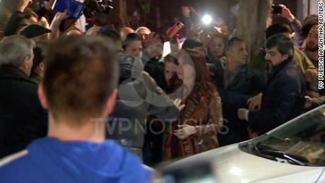 Fernandez de Kirchner is escorted away after the incident at the entrance of her home in Buenos Aires, Argentina, on September 1, 2022.