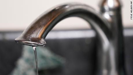 On September 1, 2022, water trickles out of the faucet in a senior living apartment in Jackson.