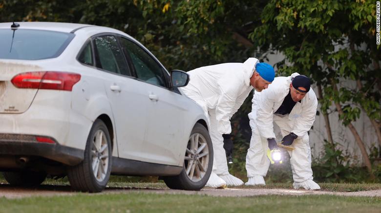 A police forensics team investigates a crime scene in the stabbing spree that left 10 dead. 