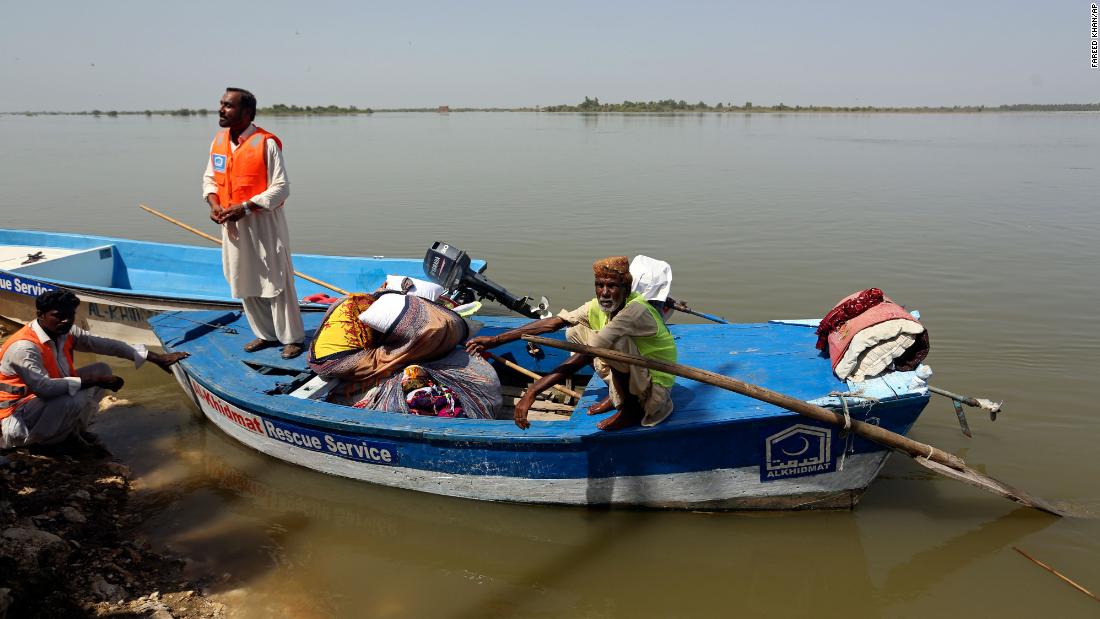 Flood-hit Pakistan breaches lake in bid to save densely populated cities