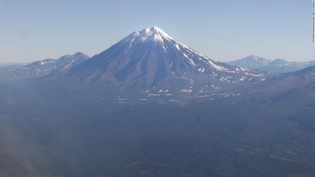 Rescuers search for survivors after eight die while trying to climb Russian volcano 