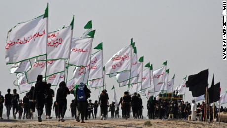 Iraqi Shia Muslim pilgrims march from the country's southern Dhi Kar province to the holy city of Karbala ahead of the Arbin religious festival on Saturday.  Every year, pilgrims gather in large numbers before Arbain in the holy Iraqi cities of Najaf and Karbala, marking the 40th day after Ashura, which commemorates the seventh-century assassination of Imam Hussein, the grandson of the Prophet Muhammad. . 