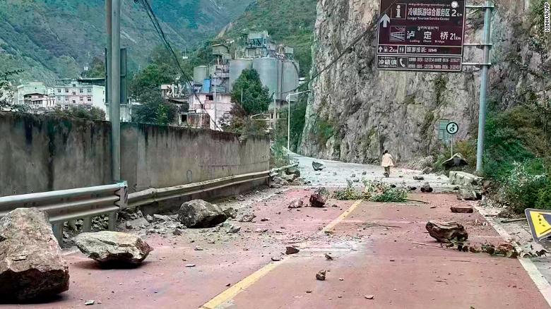 In this photo provided by China&#39;s Xinhua News Agency, fallen rocks are seen on a road near Lengqi Town in Luding County of southwest China&#39;s Sichuan Province on Monday, September 5, 2022.  
