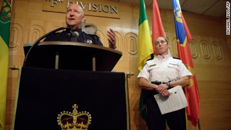 Regina Police Chief Evan Bray, left, speaks as Assistant Commissioner Rhonda Blackmore looks on during a press conference Monday.