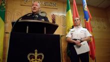 Regina Police Chief Evan Bray (left) speaks during Monday's press conference as Assistant Rhonda Blackmore looks on.
