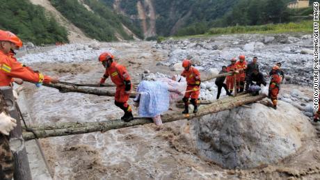 Rescuers transfer injured people in Luding county, Ganzi prefecture, Sichuan Province, China, Sept 5, 2022.