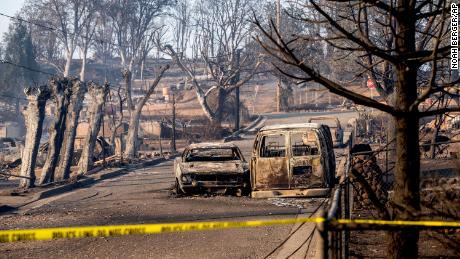 Rows of vehicles and homes destroyed by a factory fire Saturday in Weed, Calif. 