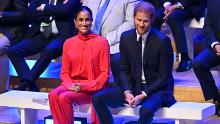 Meghan Markle, Duchess of Sussex and Prince Harry reacted while attending the annual One Young World Summit in Manchester, North West England on September 5, 2022.