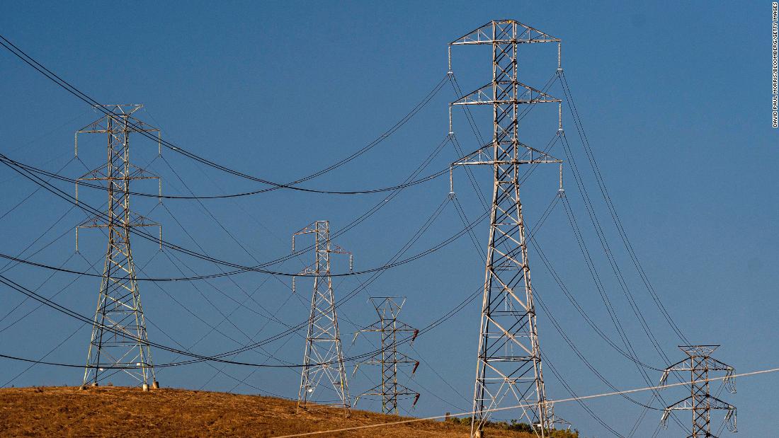 Electrical transmission towers are seen in Vallejo, California, on Sunday, September 4. Blisteringly hot temperatures and a rash of wildfires are posing a twin threat to California&#39;s power grid.