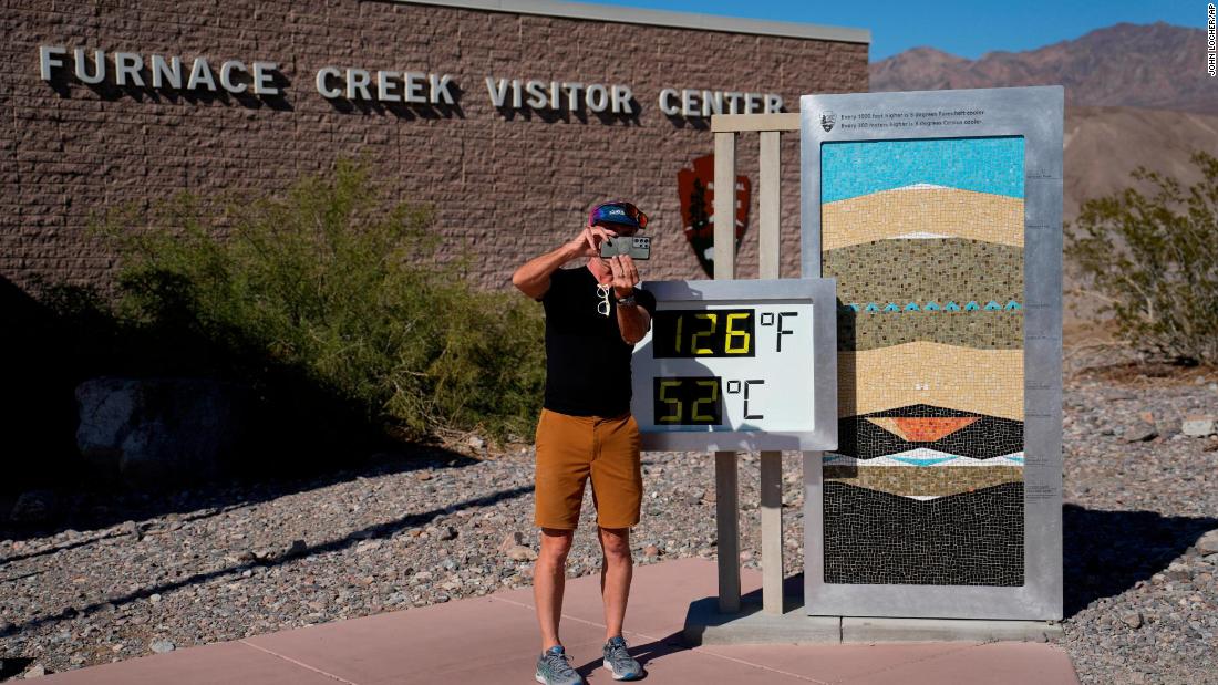 A man takes a selfie at a thermometer in California&#39;s Death Valley National Park on Thursday, September 1.