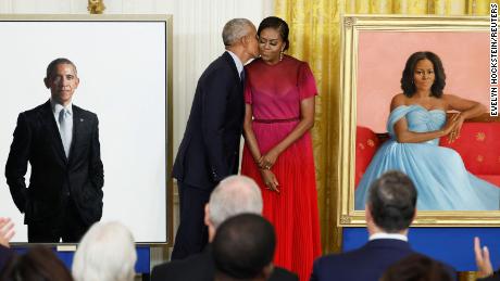 Barack and Michelle Obama make first joint return to the White House for unveiling of official portraits