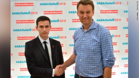 Sokolov, pictured with Alexei Navalny, was not close enough to share information with the opposition leader and was told to report the source of the money.
