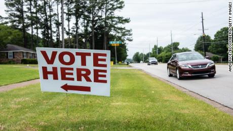 A &quot;Vote Here&quot; sign located outside a polling station in Huntsville, Alabama, US, on Tuesday, May 24, 2022. 
