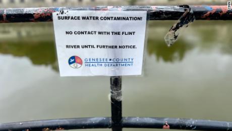 Passersby are still warned to keep away from the Flint River, years after the city&#39;s water crisis came to light. 