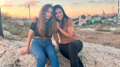 Ahed Tamimi, left, and Dena Takruri posing for a photograph in the West Bank region of the Palestinian territories.