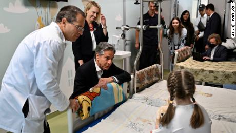 US Secretary of State Antony Blinken talks with Maryna, 6, from Kherson region, during his visit to a children hospital in Kyiv.