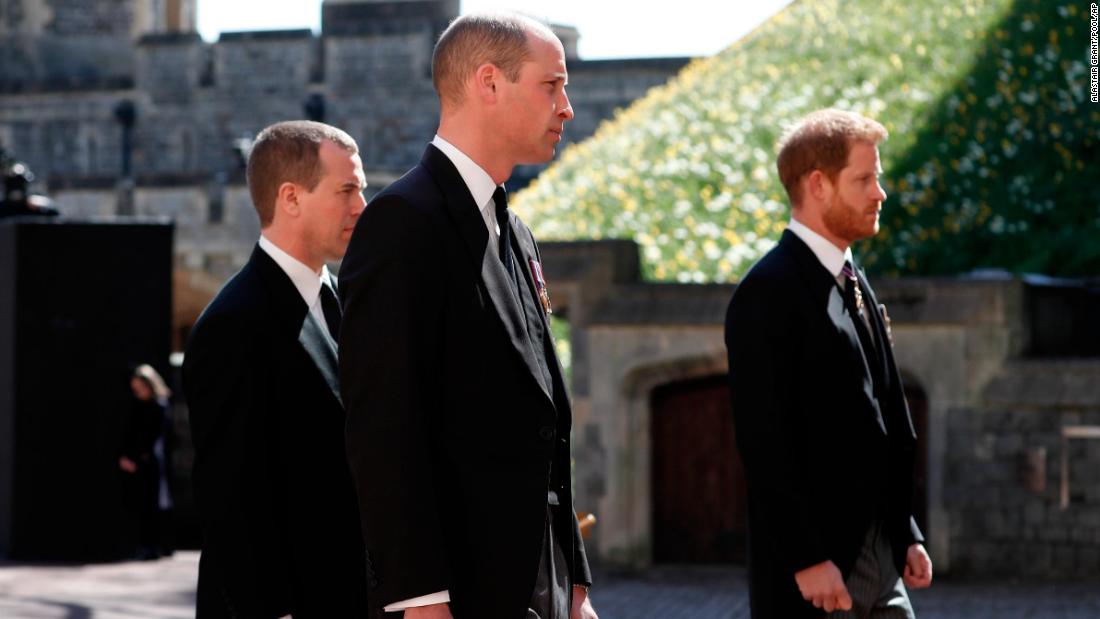 William and Harry are joined by Peter Phillips, left, during a ceremonial procession at the funeral of Prince Philip in April 2021.