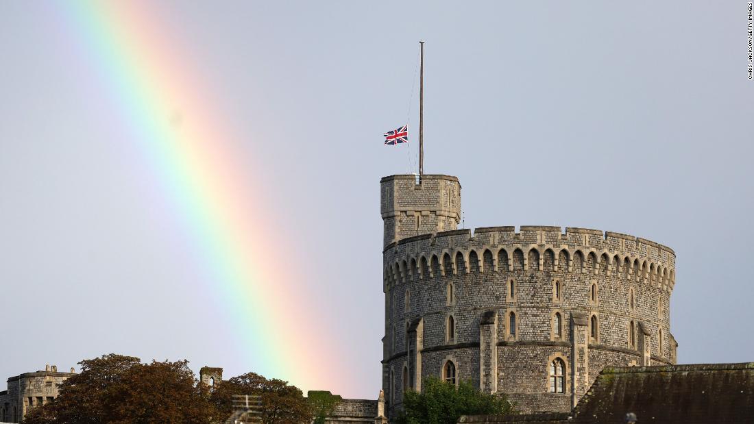 A rainbow is seen near Windsor Castle as the Union Flag is lowered after the Queen&#39;s death.