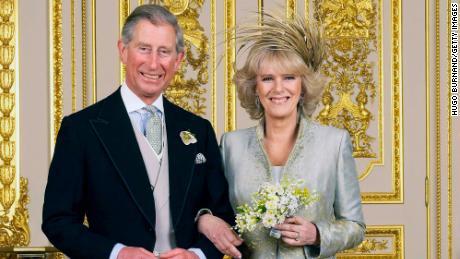Charles and his new bride Camilla pose in the White Drawing Room at Windsor Castle after their wedding ceremony on April 9, 2005 in Windsor, England.