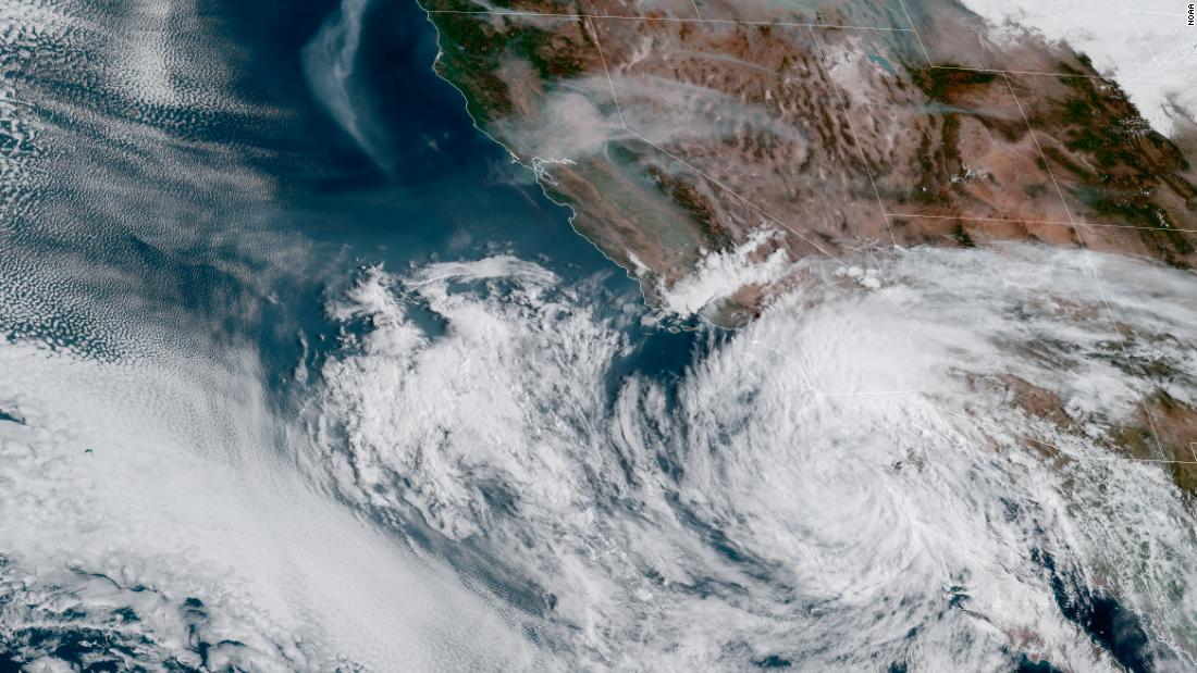 Brutal winds whip Southern California as Tropical Storm Kay boosts already-hot temps and starts dousing flood-prone spots – CNN