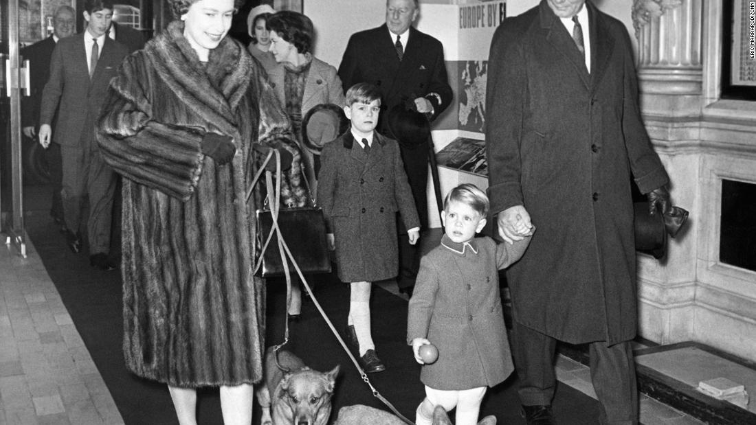The Queen leads her corgis into Liverpool Street Station in London in 1966.