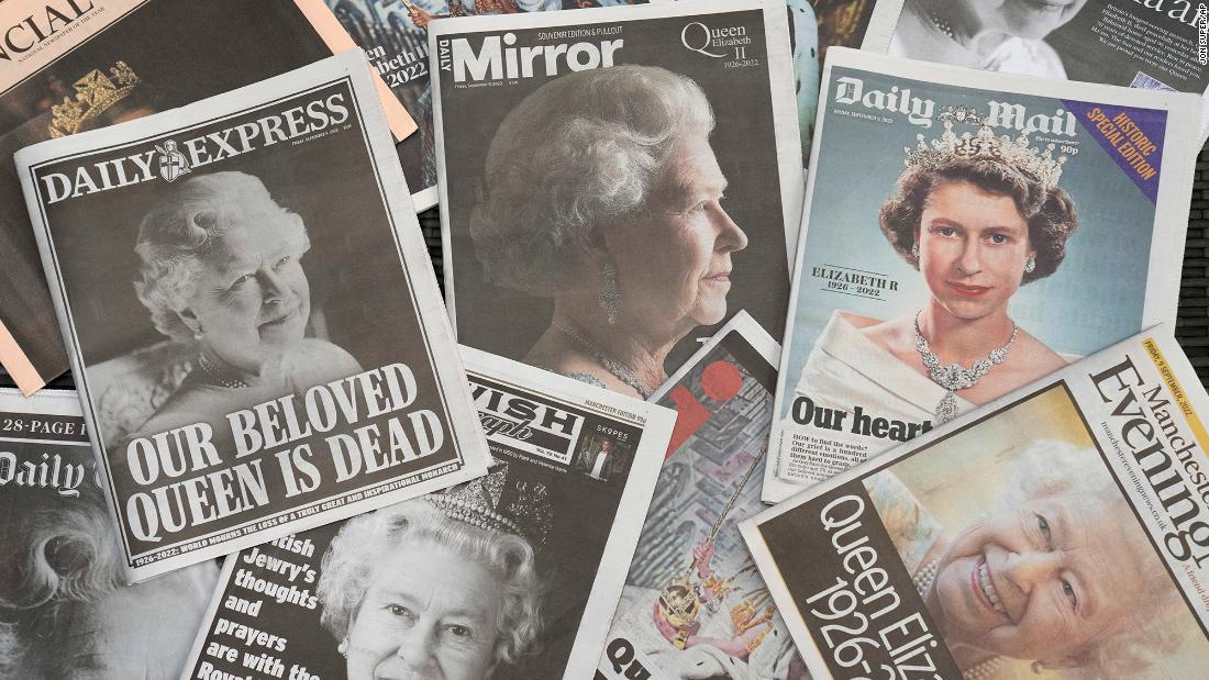 Newspapers covering the Queen&#39;s death are seen in Manchester, England, on September 9.