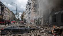 Firefighters work at the site of a home attacked by a Russian airstrike in Kharkov, Ukraine, September 6.