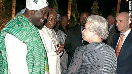 Nigerian magazine publisher Dele Momodu met Queen Elizabeth on a 2003 state visit to Abuja, Nigeria. 