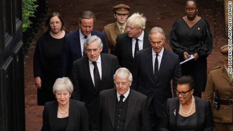(Front L to R) Britain's former Prime Ministers Theresa May, John Major, and Baroness Scotland, (Second row from L to R) Britain's former Prime Ministers Gordon Brown, Tony Blair, (third row from L to R) Britain's former Prime Ministers David Cameron and Boris Johnson, arrive for a meeting of the Accession Council inside St James's Palace in London on September 10, 2022, to proclaim King Charles III as the new King. - Britain's Charles III was officially proclaimed King in a ceremony on Saturday, a day after he vowed in his first speech to mourning subjects that he would emulate his &quot;darling mama&quot;, Queen Elizabeth II who died on September 8. 