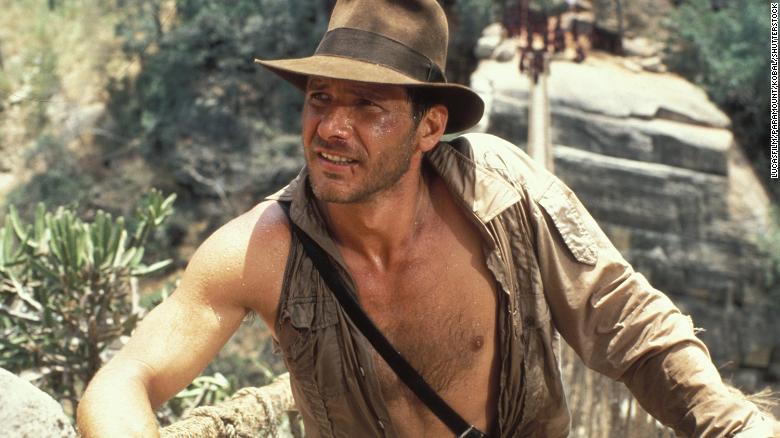 Harrison Ford has opened up about reprising his role as Indiana Jones, seen here in 1984&#39;s &quot;Indiana Jones and The Temple Of Doom.&quot;