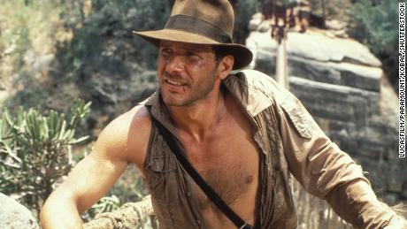 Harrison Ford has opened up about reprising his role as Indiana Jones, seen here in 1984&#39;s &quot;Indiana Jones and The Temple Of Doom.&quot;