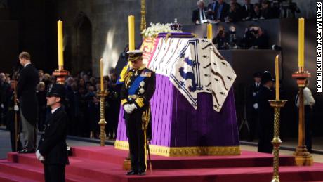 Then-Prince Charles and his brother Edward, left, stand vigil next to their grandmother's coffin as the Queen Mother lies in state at Westminster Hall in 2002.