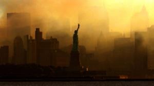 The Statue of Liberty can be seen at first light from a view from Jersey City, N.J., as the lower Manhattan skyline is seen though a thick smoke filled the sky early Saturday, Sept. 15, 2001. New York continues to recover following terrorist attacks at the World Trade Center last Tuesday. (AP Photo/Dan Loh)