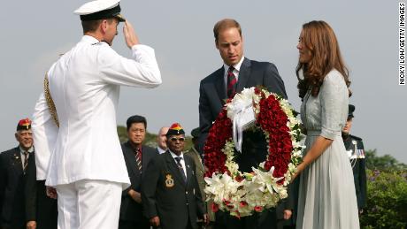 Prince William and Catherine at the Kranji War Memorial in Singapore in 2012.