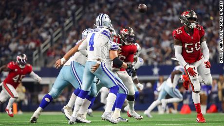 Dallas Cowboys quarterback Dak Prescott reacts after injuring his thumb when he hit his hand against Tampa Bay Buccaneers linebacker Shaq Barrett during the fourth quarter at AT&amp;T Stadium. 