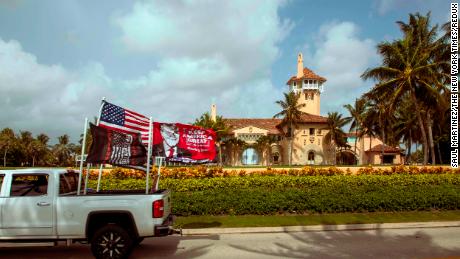 A truck displaying pro-Trump flags is dirven past Mar-a-Lago in Palm Beach, the home of former President Donald Trump, on Tuesday, Aug. 9, 2022, one day after FBI agents searched the residence. When some GOP members of Congress attacked the nation&#39;s top law enforcement agencies immediately after the FBI&#39;s search of Mar-a-Lago, it opened deep fissures within the party. (Saul Martinez/The New York Times)
