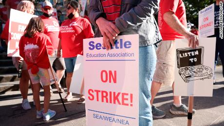 Teachers from Seattle Public Schools picket outside Roosevelt High School on what was supposed to be the first day of classes Wednesday.