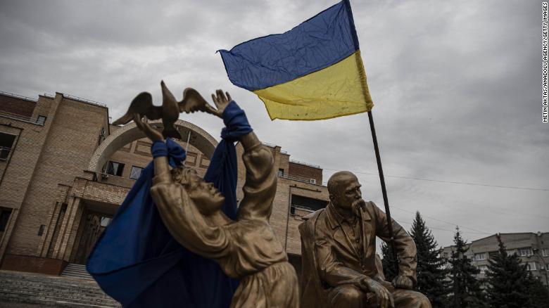 The Ukrainian flag waves after the Ukrainian army liberated the town of Balakliya in the southeastern Kharkiv oblast, Ukraine, on September 11, 2022. 