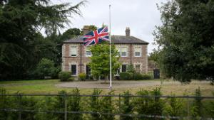 DORCHESTER, DORSET - SEPTEMBER 09: The Union flag flies at half mast at The Duchy of Cornwall headquarters at Poundbury, on September 09, 2022 in Dorchester, Dorset. Elizabeth Alexandra Mary Windsor was born in Bruton Street, Mayfair, London on 21 April 1926. She married Prince Philip in 1947 and acceded the throne of the United Kingdom and Commonwealth on 6 February 1952 after the death of her Father, King George VI. Queen Elizabeth II died at Balmoral Castle in Scotland on September 8, 2022, and is succeeded by her eldest son, King Charles III.  (Photo by Finnbarr Webster/Getty Images)