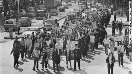 Meat porters of Smithfield Market in London march to the Houses of Parliament in protest against the expected influx of Ugandan Asians, September 1972. 