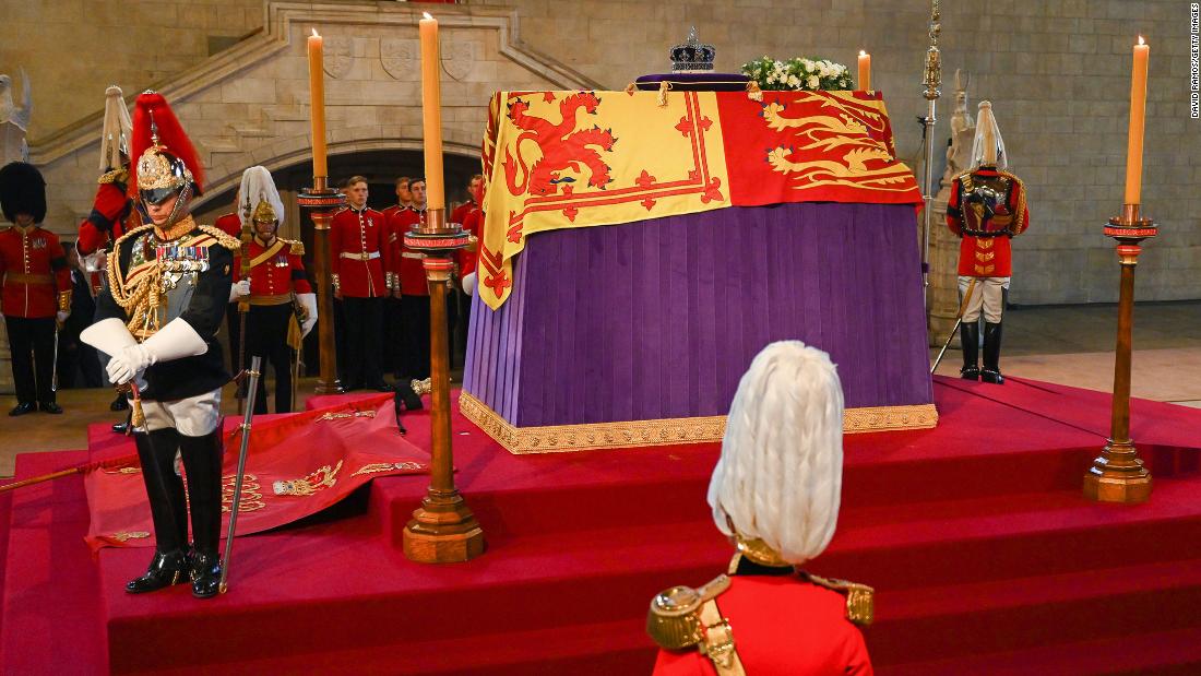 Mourners queue for miles to say goodbye to Queen Elizabeth as coffin lies in state at Westminster Hall – CNN