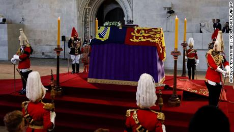 The coffin of Queen Elizabeth II arrives at Westminster Hall from Buckingham Palace for her lying in state on Wednesday, September 14, 2022.  