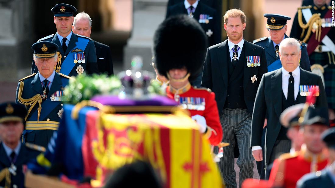 The King and his sons, Prince William and Prince Harry, walk behind the coffin during Wednesday&#39;s procession.