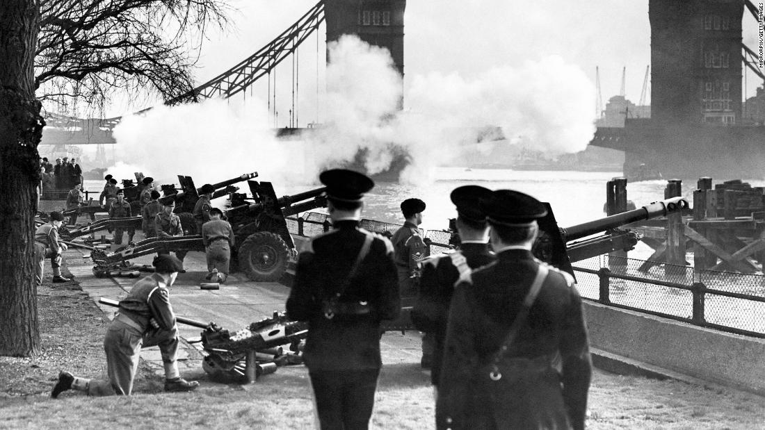 Members of the Honourable Artillery Company fire a gun salute in London.