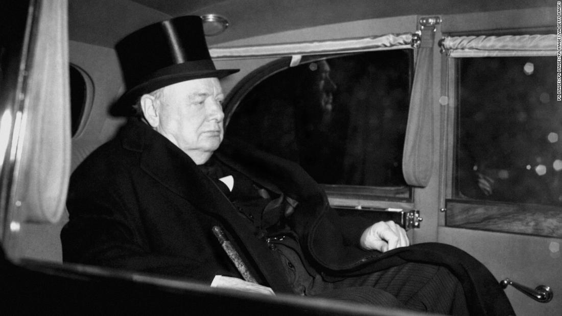 Prime Minister Winston Churchill leaves St. James&#39;s Palace after attending a meeting of the Accession Council, which is automatically summoned on the death of the sovereign.